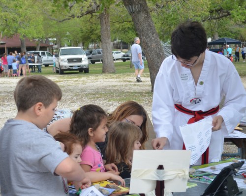 Young invasive hunters working on their battle diorama