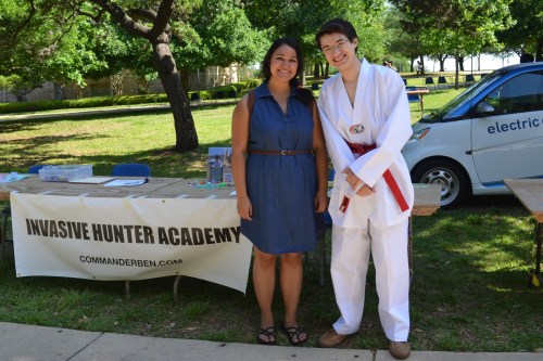 Commander Ben and Phoebe Anne Romero meet in front of the Invasive Hunter Academy before Earth Day festivities