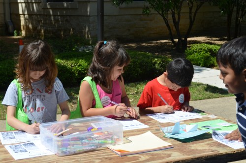 Young Austin naturalists working on their Invasive Hunter Academy action dioramas