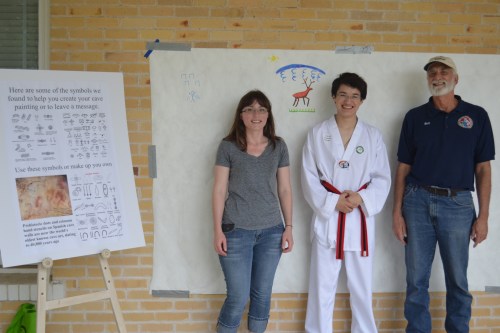 Petroglyphs wall activity at the beginning of the Muster Days event before kids started adding their cave drawings