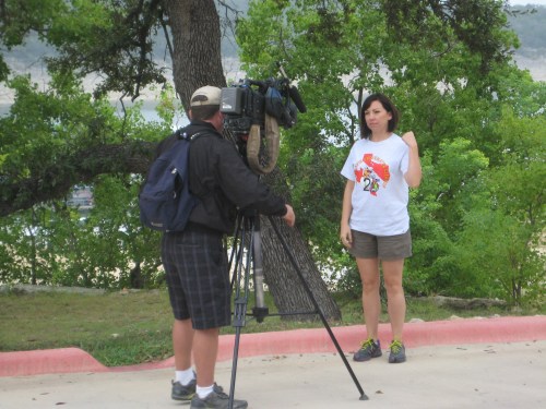Sarah Richards being interviewed by KVUE about the Lake Travis Cleanup event